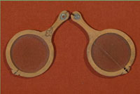 A pair of leather spectacles, found, among other artifacts, in 1953 beneath the floorboards of Kloster Wienhausen, near Celle, in Germany. (View Larger)
