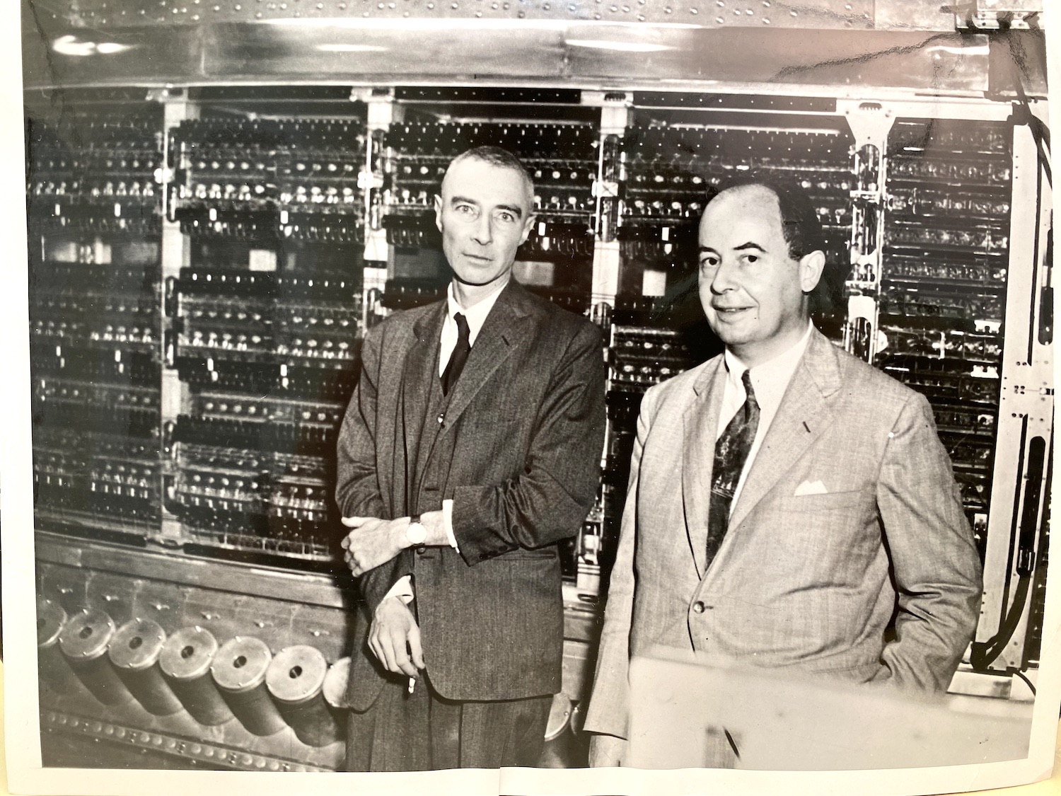 Robert Oppenheimer (left) and John von Neumann in front of the Princeton IAS computer on the day it was announced to the public.