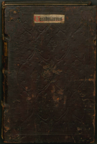 15th century German blindstamped calf binding on the Bayerische Staatsbibliothek copy of Vocabularius. Note the attractive title label pasted to the upper cover. Most of these came loose or fell off over the centuries; this one in two colors, is unusually well preserved.