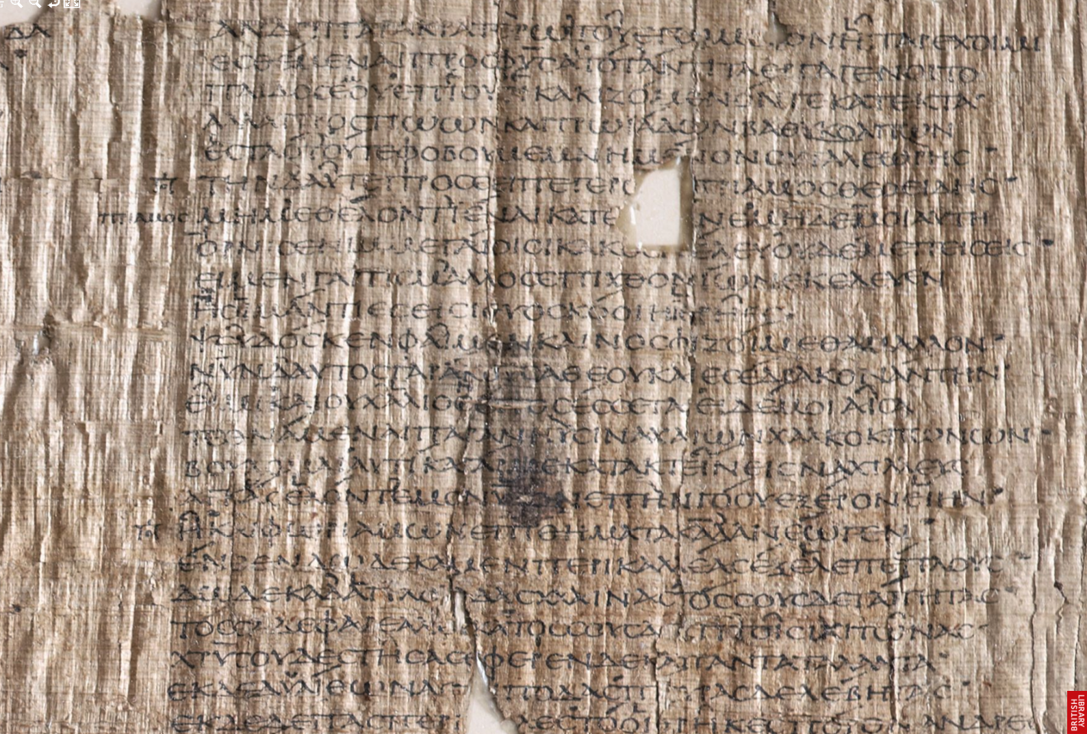 An enlarged photograph of a section of  the digitized Bankes Homer. P. Lond. Lit. 28, TM 60500. Notes in the left margin of the page include the names of characters to "passage of direct speech as well as abbreviated notes marking narrative sections in the text."