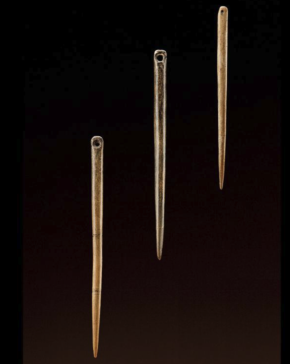 Bone needles from Xiaogushan, Liaoning Province, China, about 30,000–23,000 years old. Photo by Chip Clark, Smithsonian Institution,