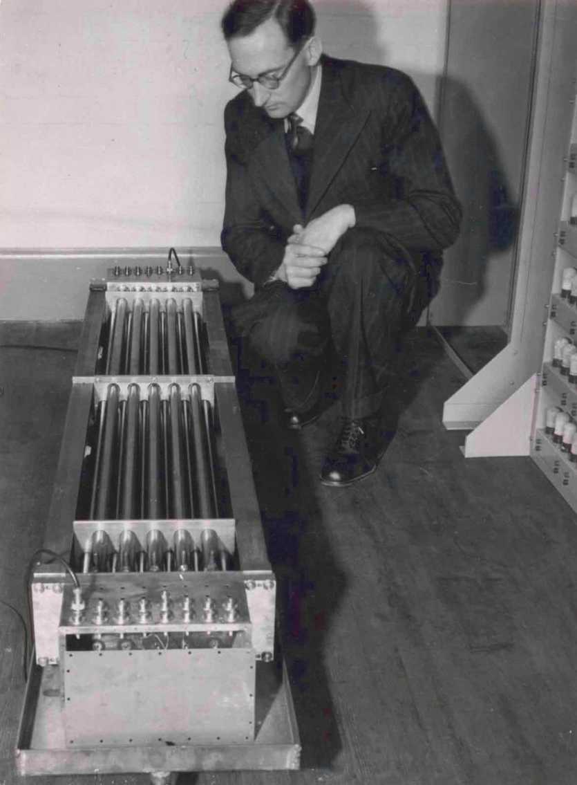 Maurice Wilkes examining the mercury delay-line memory for the EDSAC while it was under construction.