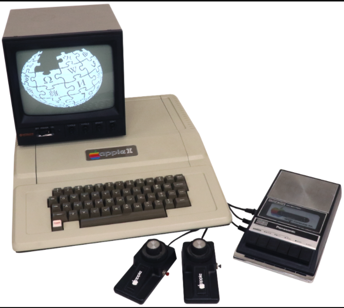 A clever photograph of the standard configuration of the Apple II taken with the Wikipedia in mind since the monitor displays the Wikipedia logo.