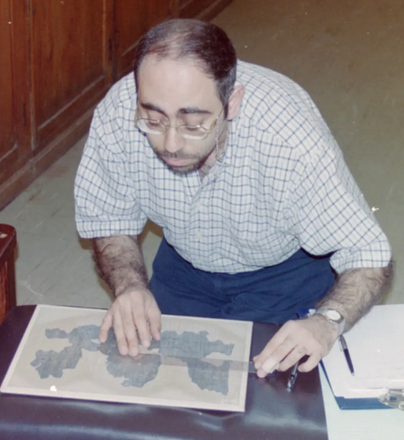 Wael Sherbiny working on a portion of the manuscript at the Cairo Museum