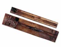 Two Egyptian scribal palettes preserved in the British Museum. (View Larger)