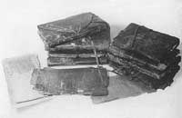 Several of the leather-bound codices of the Nag Hammadi Library. (View Larger)
