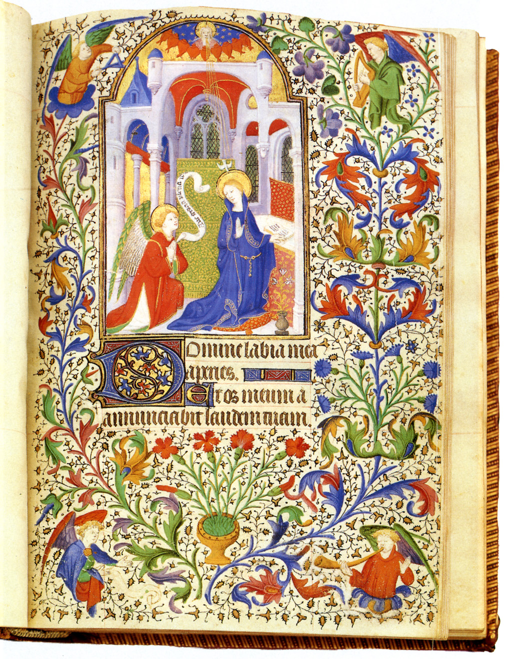 A miniature of the Annunciation from a French Book of Hours showing very elaborate manuscript illumination.