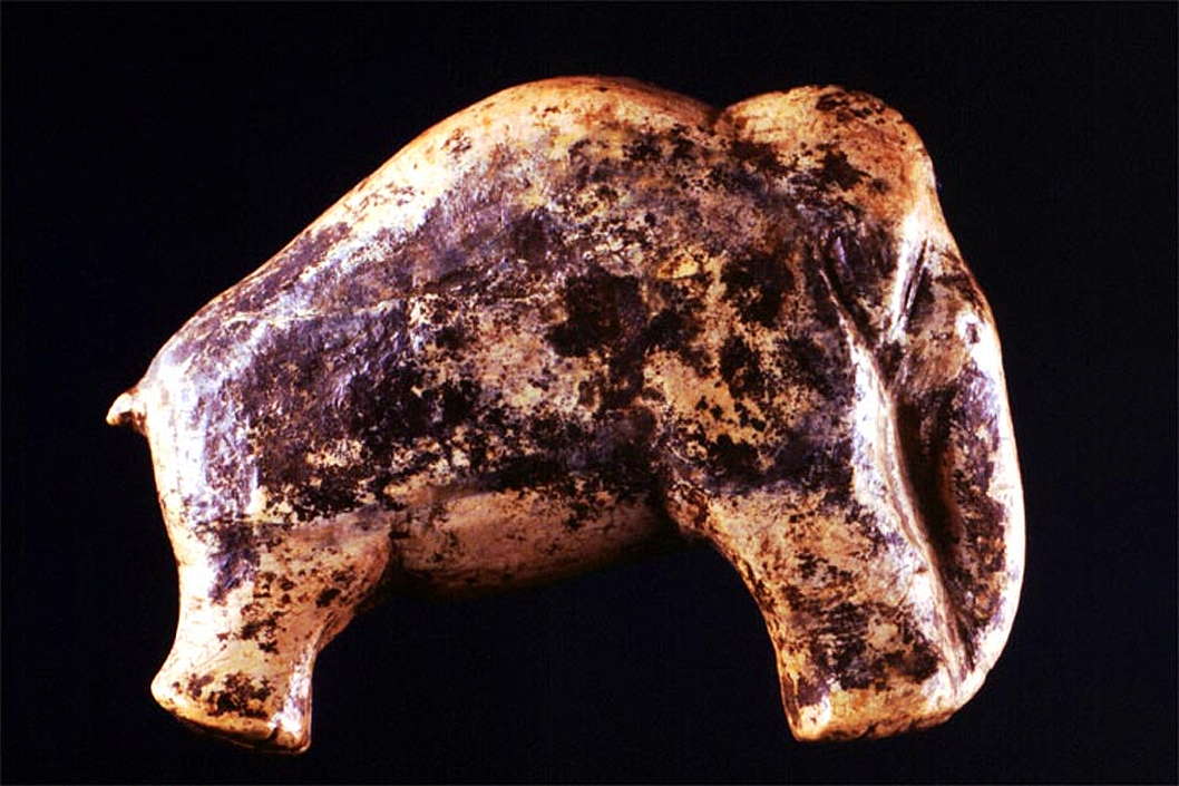37mm long, 7.5 gram figurine, made from mammoth ivory is some 35,000 years old. It is one of the oldest pieces of art ever found.  Photo: Universität Tübingen. (Click on image to view larger.)