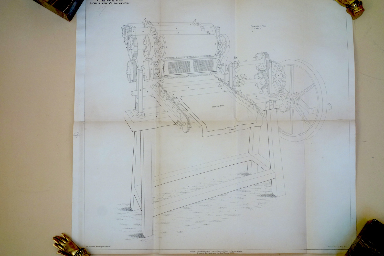 An unusally complete perspective view of the Bacon & Donkin rotary press from their patent