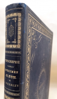 Notice the unusual detail in the tooling of the spine and also intricate detail of the lettering.