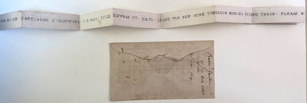 Back of the House Printing Telegraph envelop showing the docketing, with the beginning of the telegram print-out.