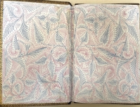 The highly distinctive endpapers on this work appear to have been designed by Owen Jones.