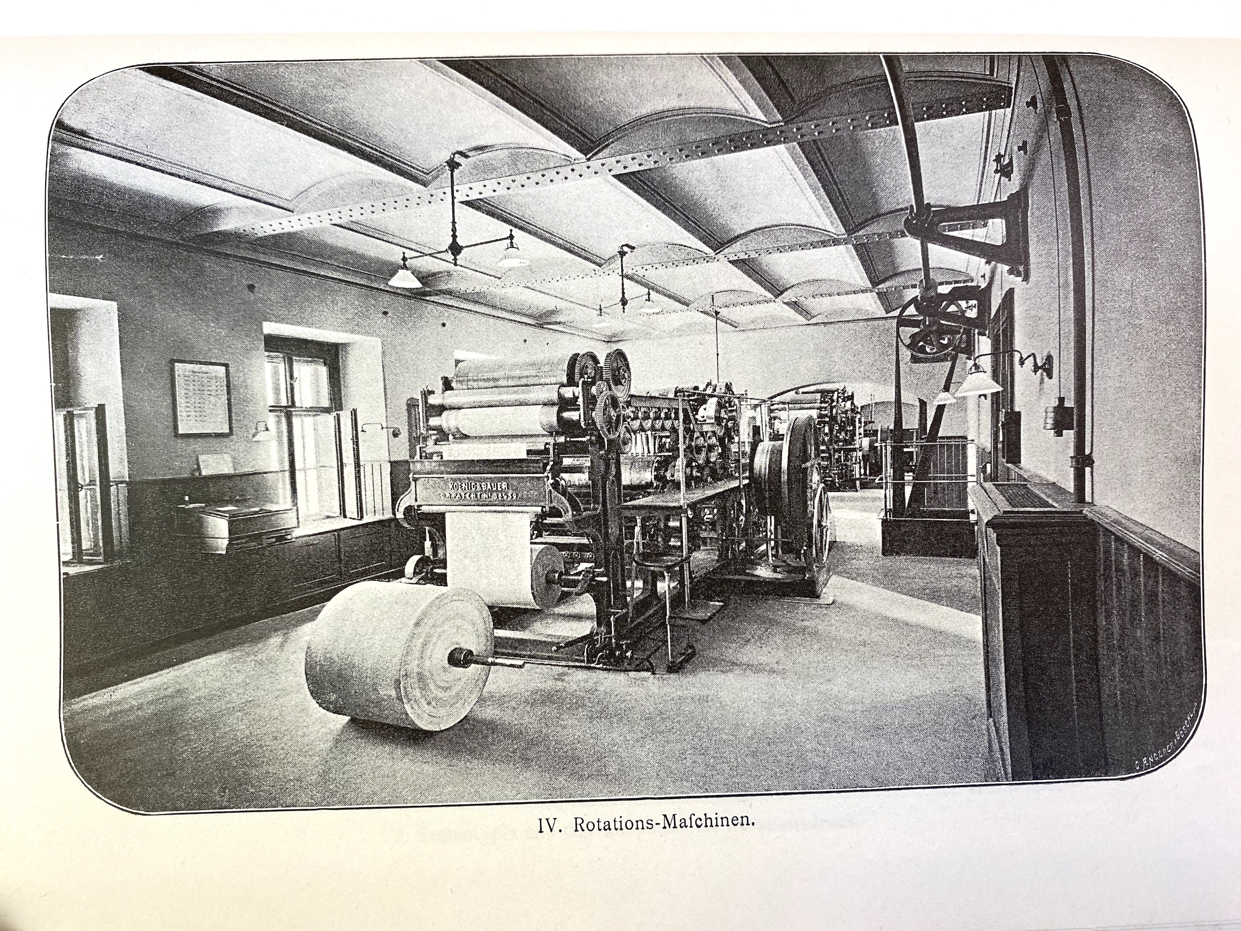 Two huge web presses built by Koenig und Bauer. One is visible behind the first press.