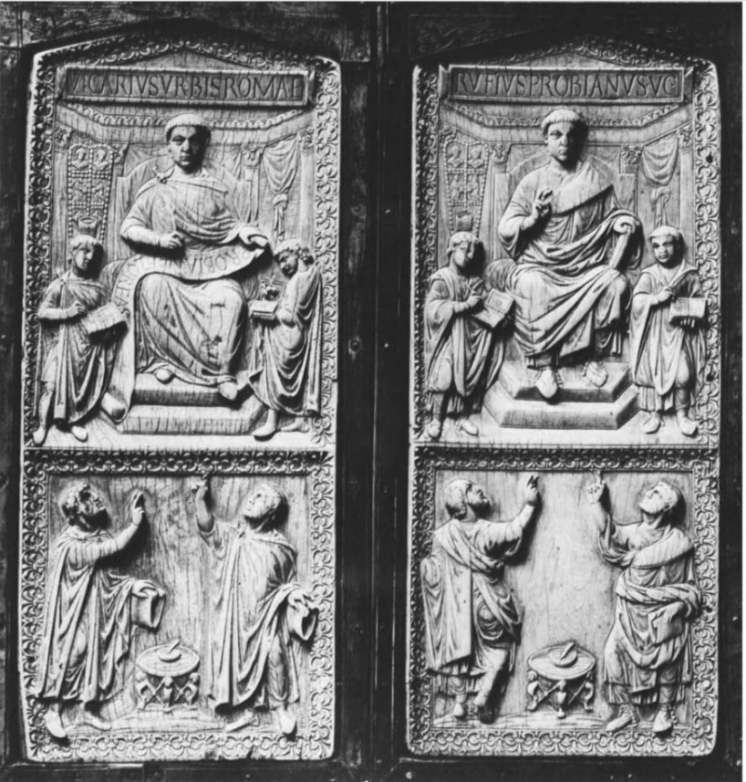 The diptych of Probianus. In the left upper image we see Probianus writing on a scroll, with his secretaries writing on wax tablets. In the write upper image we see Probianus with his right hand raised in an oratorical position. In the left lower image we see orators with their right hands raised while they hold papyrus rolls in their left hands, with their fingers used as place holders. This detail is even clearer in the depiction of the right figure in the lower right image.