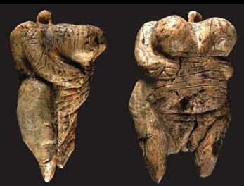 Two views of the Venus of Hohle Fels figurine (height 6 cm (2.4 in)). This figurine may have been worn as an amulet. It is the earliest known, undisputed example of a depiction of a human being in prehistoric art.