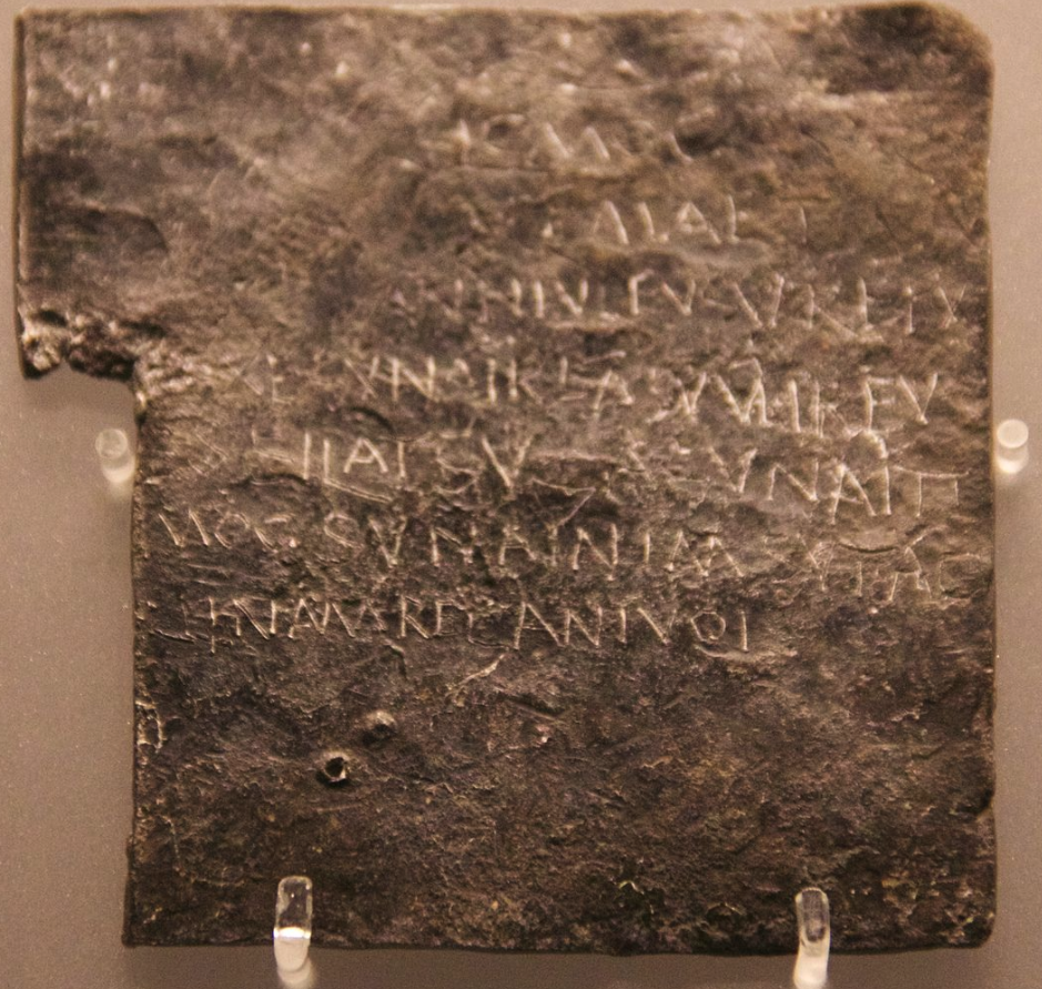 One of the Bath Curse Tablets with a complaint about the theft of Vilbia. The tablets, discovered in 1979/80 in Bath, were initally assumed to be made of lead, but, after metallurgical analysis, were recognized to be made of lead alloyed with tin, and occasional traces of copper.