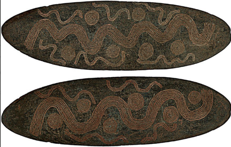 Churinga: Wavy parallel lines linking concentric circles representing waterholes. North Territories, Australia, before 1800 CE. Shøyen Collection MS 4467.
 