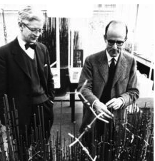 John Kendrew and Max Perutz looking at part of the model of the structure of a protein. MRC Laboratory of Molecular Biology, Cambridge University.