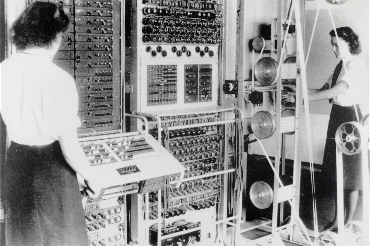A Colossus Mark 2 codebreaking computer being operated by Dorothy Du Boisson (left) and Elsie Booker (right), at Bletchley Park, 1943.