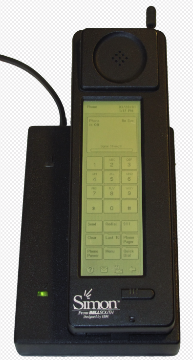 A Simon Personal Communicator in its charging base