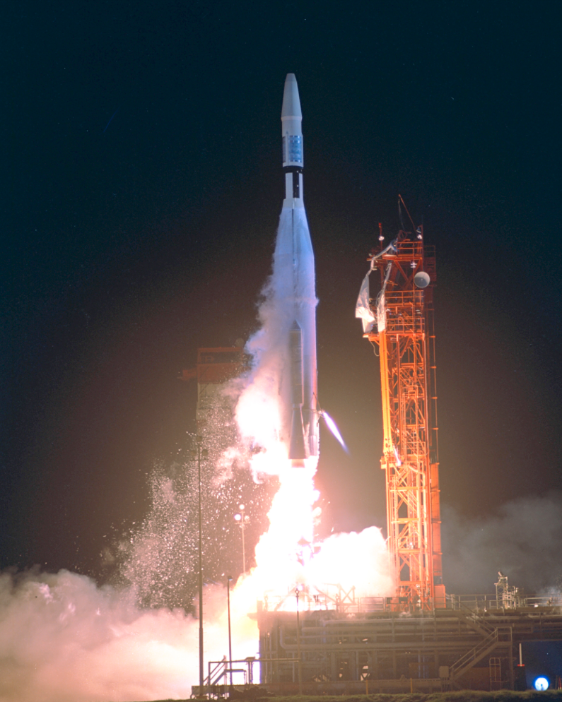 Color photograph of An Atlas-Agena 5 rocket carrying the Mariner 1 spacecraft lifting off from Cape Kennedy Launch Complex 12.