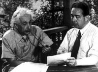 Albert Einstein conferring with Leo Szilard