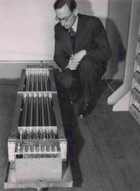 Maurice Wilkes examining the mercury delay-line memory for the EDSAC while it was under construction.