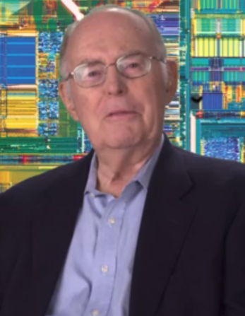 Photograph of Gordon Moore superimposed over an enlargement of portions of a microprocessor.