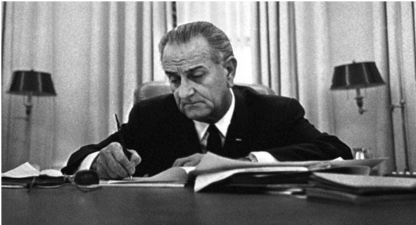 President Lyndon B. Johnson signing the Freedom of Information Act.