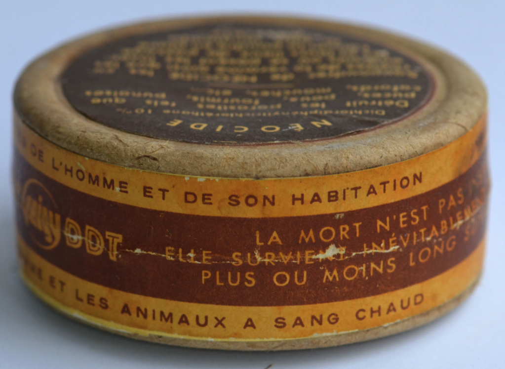 "Commercial product (Powder box, 50 g) containing 10% DDT; Néocide. Ciba Geigy DDT; "Destroys parasites such as fleas, lice, ants, bedbugs, cockroaches, flies, etc.. Néocide Sprinkle caches of vermin and the places where there are insects and their places of passage. Leave the powder in place as long as possible." "Destroy the parasites of man and his dwelling". "Death is not instantaneous, it follows inevitably sooner or later." "French manufacturing"; "harmless to humans and warm-blooded animals" "sure and lasting effect. Odorless."
