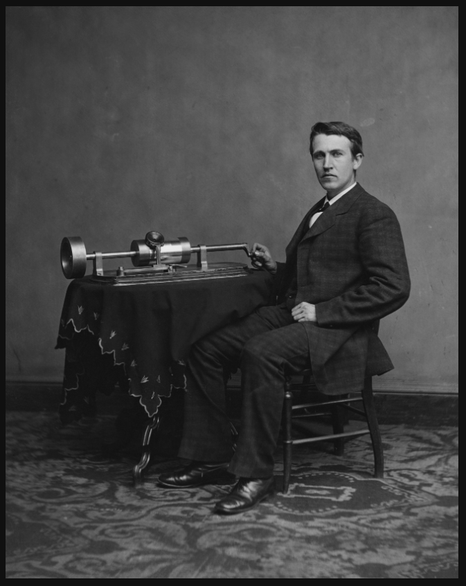 Edison and his phonograph. Image by Mathhew Brady. Probably taken in 1878.