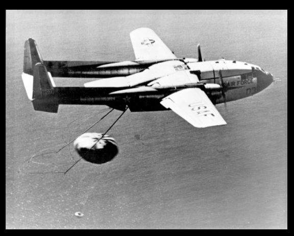 Fairchild C-119J Flying Boxcar recovers CORONA film capsule in 1960. 
