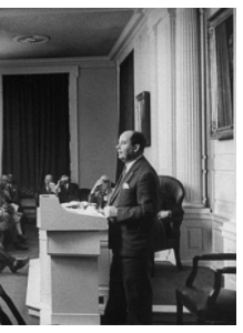Von Neumann lecturing at the American Philosophical Society in 1957 (cropped).