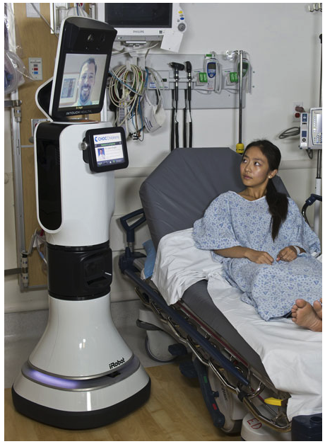 photograph of the RP-Vita telemedicine robot with a patient in a hospital bed