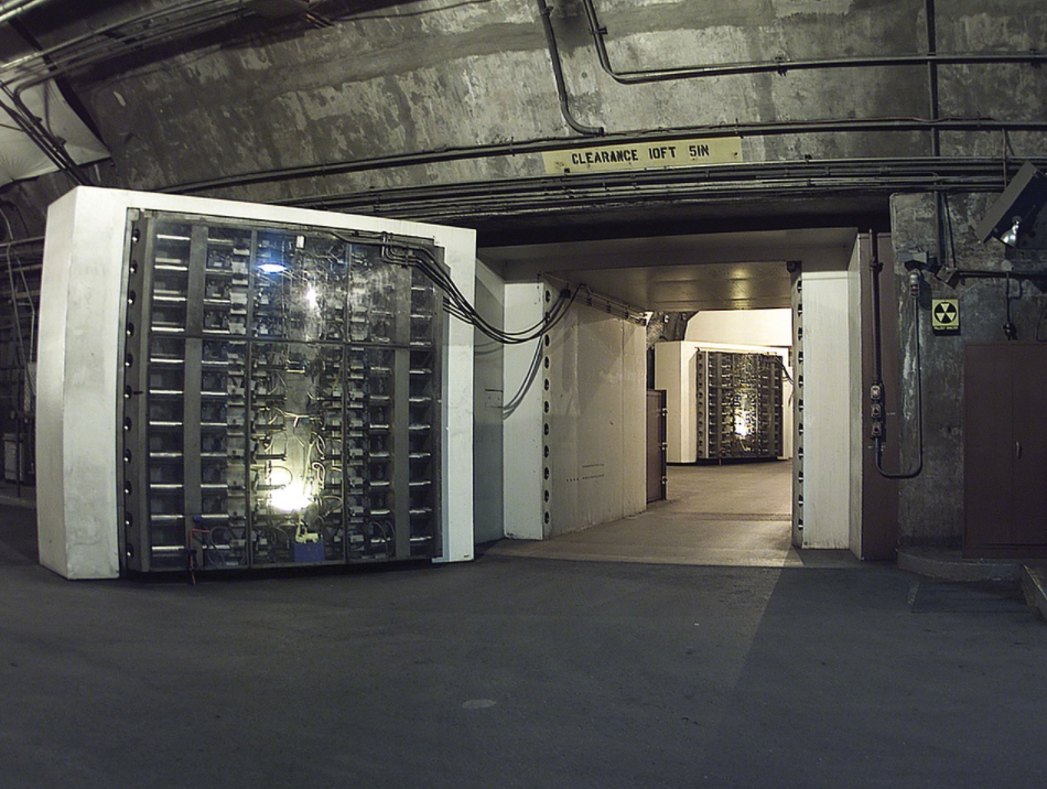 The 25-ton blast door in the Cheyenne Mountain nuclear bunker is the main entrance to another blast door (background) beyond which the side tunnel branches into access tunnels to the main cha