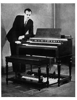 Photo of Laurens Hammond with the Hammond Organ