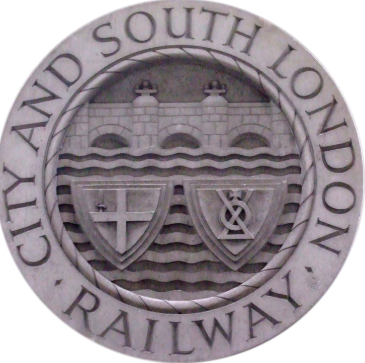 Arms of the City and South London Railway on the reserve side of the pedestal of the monument to James Henry Greathead in the City of London. 
