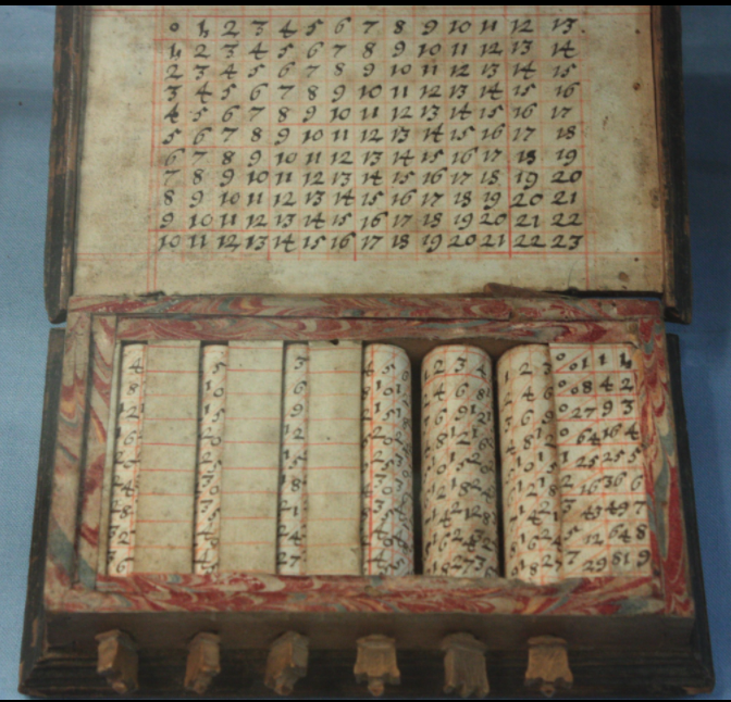 An unusually eleborate and modified version of Napier's bones made into a calculator. 18th century.