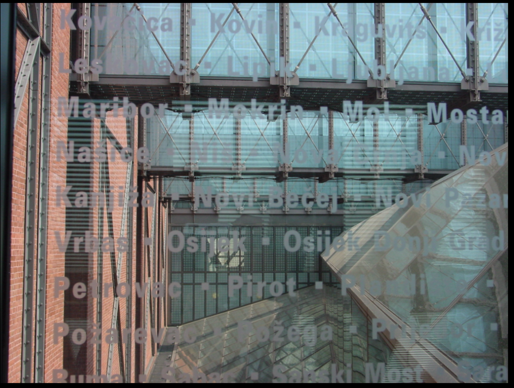 Bridges in the USHMM. Blue glass etched with names and places lost during the Holocaust.
