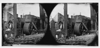 These are very slightly different images photographed by Gardner of the ruins of a paper mill with water-wheel in Richmond, Virginia.