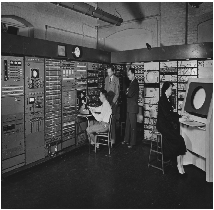Stephen Dodd, Jay Forrester, Robert Everett, and Ramona Ferenz at Whirlwind I test control in the Barta Building, 1950.