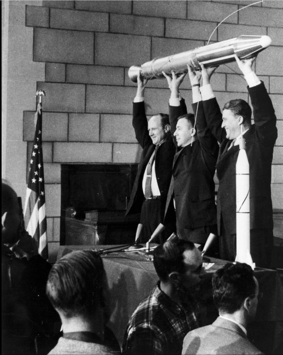 William Hayward Pickering, James Van Allen, and Wernher von Braun displayed a full-scale model of Explorer 1 with its booster at a crowded news conference in Washington, D.C. after confirmati