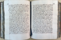 A typical page opening of the manuscript. Notice the elegant handwriting of a professional copyist or secretary.
