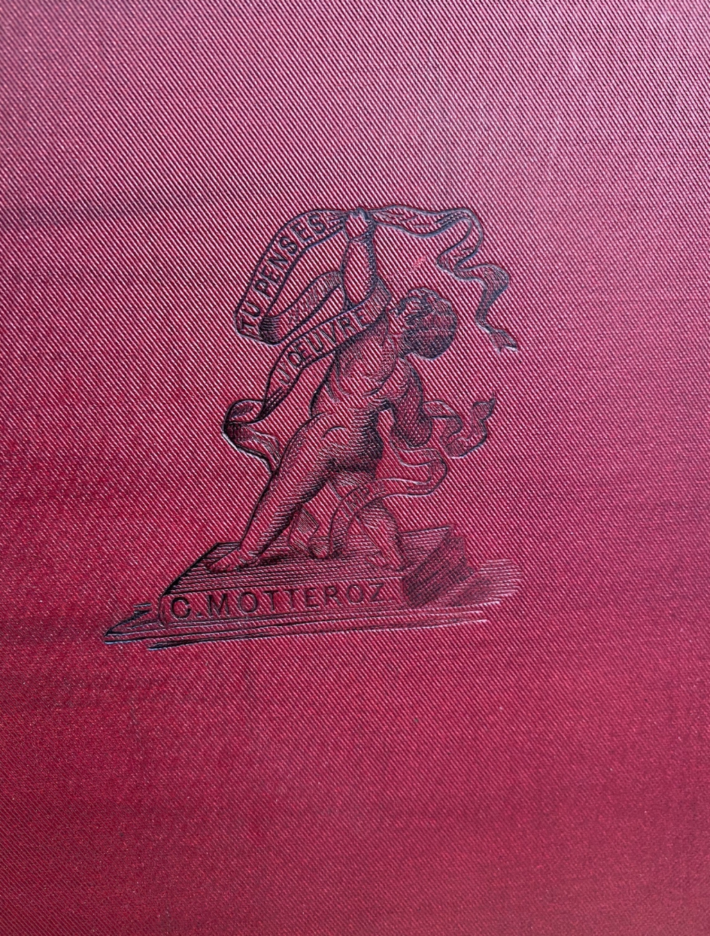 Motteroz, the printer of Vachon's book, had this unusual, baroque style printer's mark embossed on the lower cover of the original cloth binding, suggesting that his bindery probably was resp