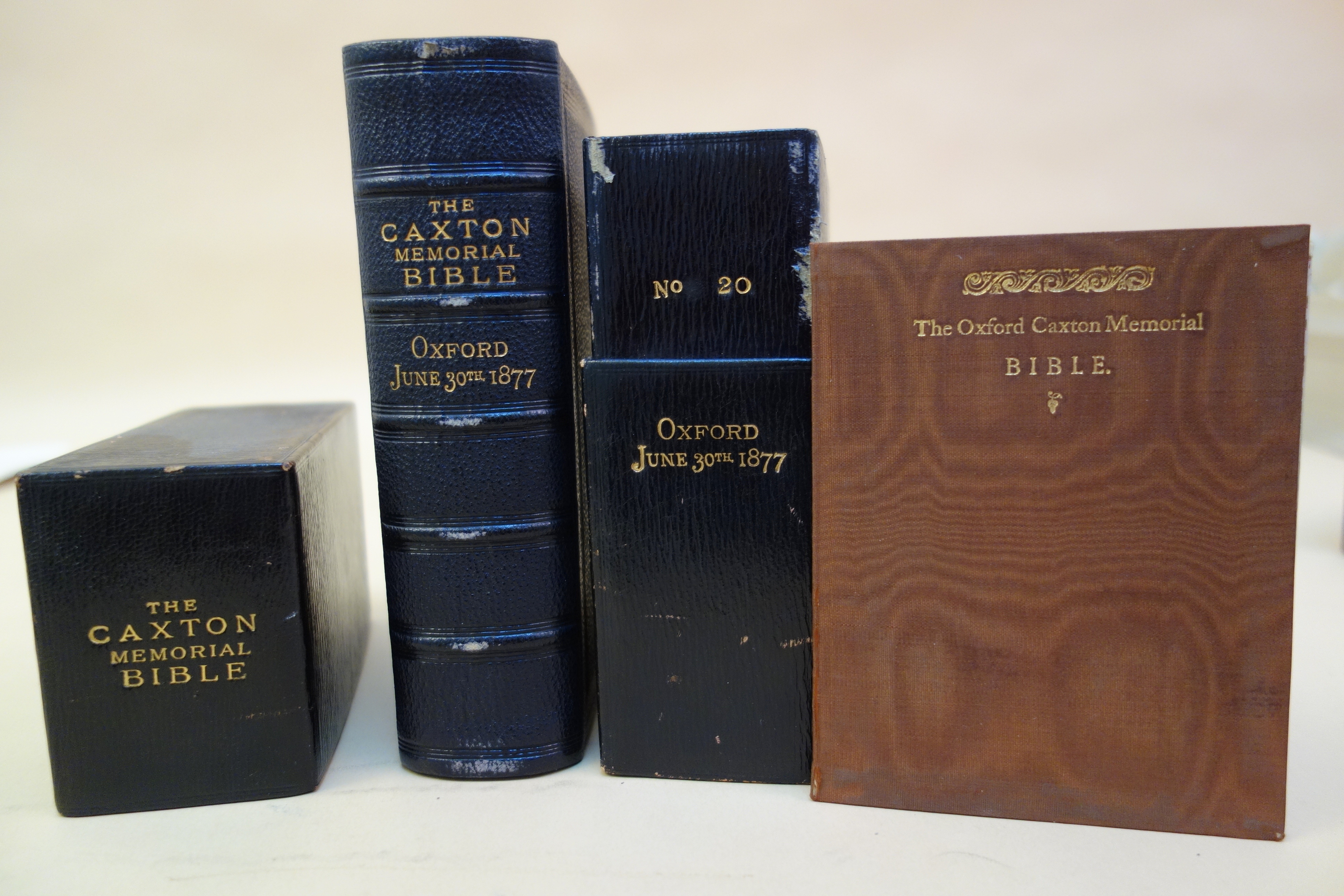 The Caxton Memorial Bible, its slipcase and the india paper version of Henry Stevens