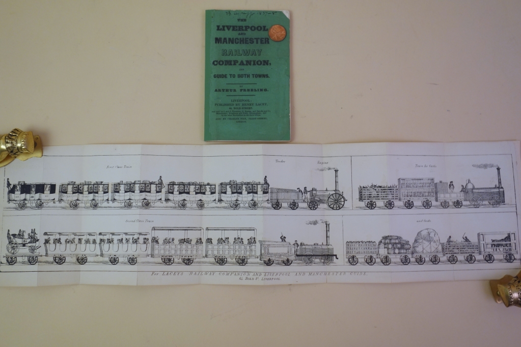 The panoramic lithographed frontispiece shows first class, second class, and freight trains and the earliest styles of train cars that were designed like horse drawn coaches except on iron wheels.