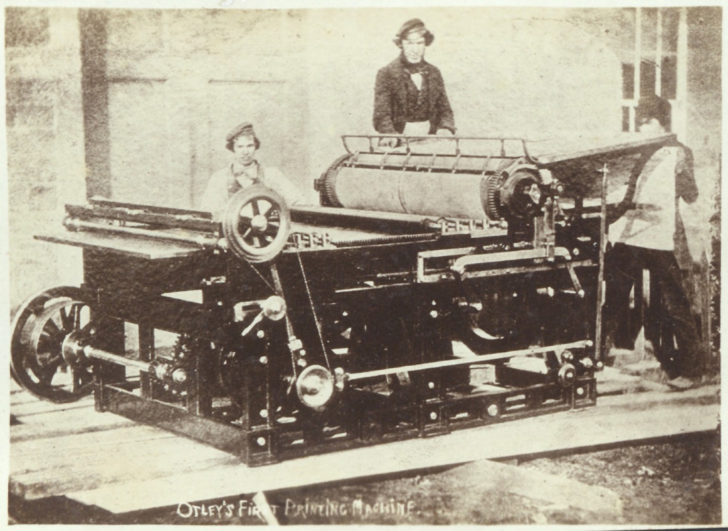 The figure in back, center of the machine might be its inventor David Payne.